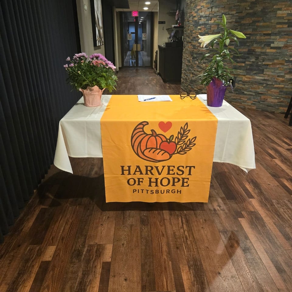 Harvest of Hope Pittsburgh welcome table